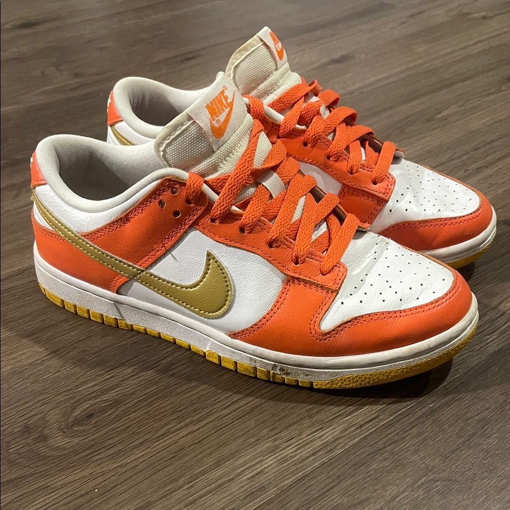 Woman’s Nike Dunk Low “Orange University Gold”